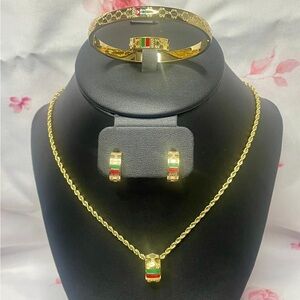 Gold Jewelry Set with Red, Green, and White Accents